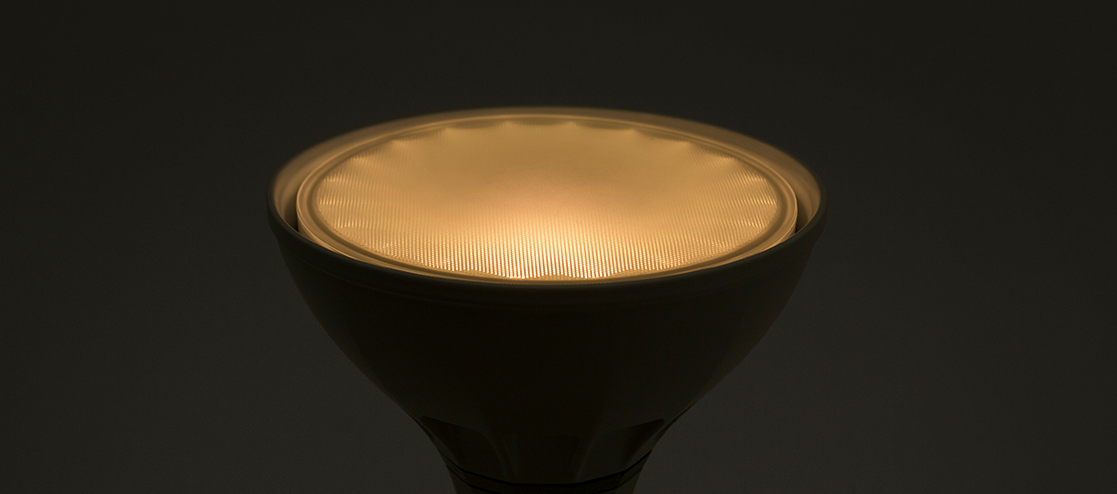 A warm light bulb pointing upwards