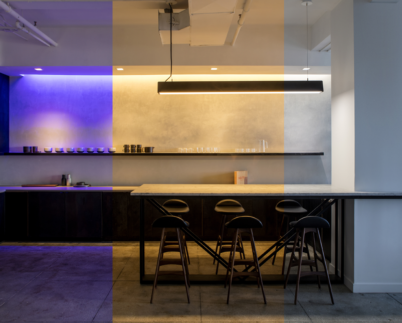 Purple light, warm white light, and brighter white light shown side by side in Ketra's NYC Showroom
